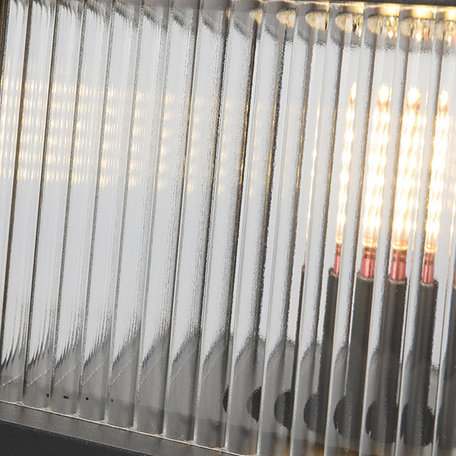 Close-up view of metal fence pickets showing detailed construction and spacing patterns