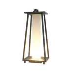Contemporary outdoor lantern with sleek angular construction creating soft ambient illumination
