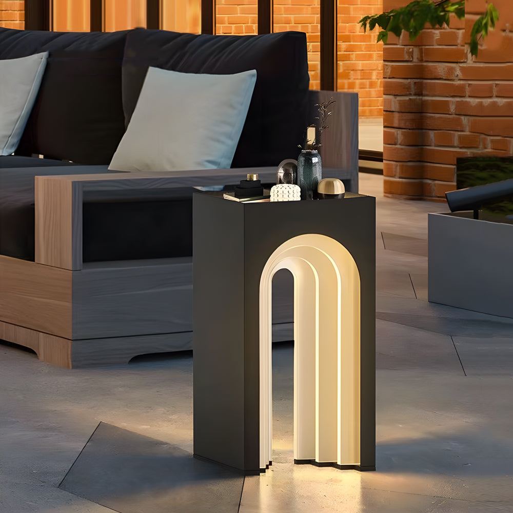 Arch lamp illuminating modern outdoor seating area