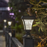Comparison of post light showing both warm and cool LED lighting options in same outdoor setting