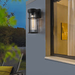 Residential entrance area featuring industrial-style wall lighting with warm ambient glow