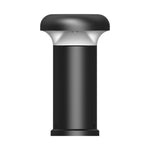 Black cylindrical bollard light with mushroom-style top for garden pathways