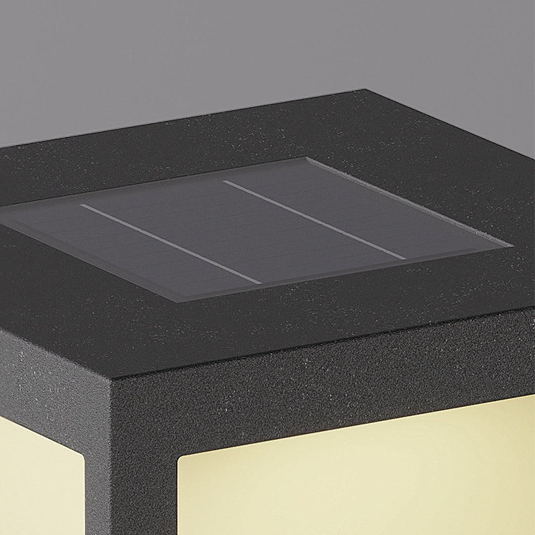 Detail view of solar panel integrated into top of cube light for renewable energy collection