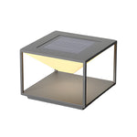 Modern cubic outdoor light fixture with solar panel top and warm LED strip illumination