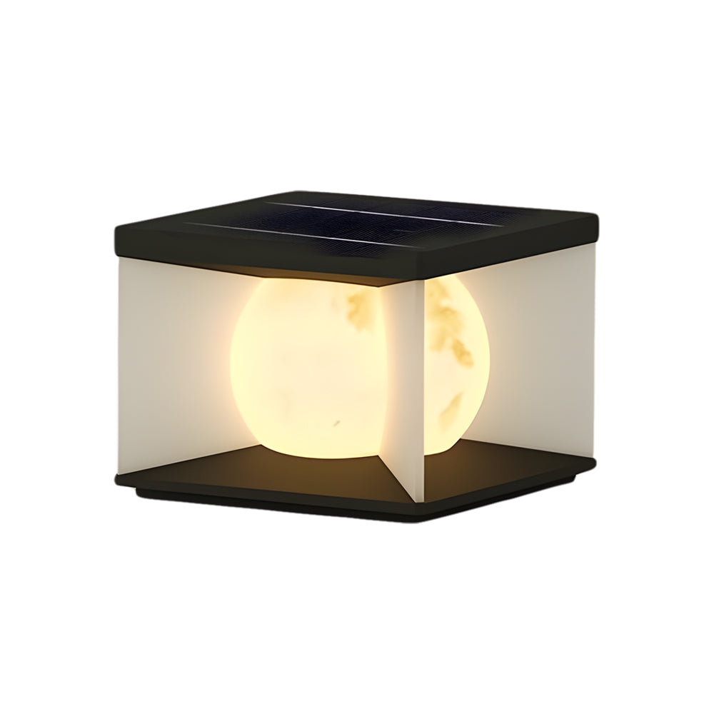 Solar post cap light featuring integrated solar panel on top and warm LED glow