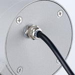 Close-up view of stakes for outdoor lights showing electrical connection and waterproof cable detail