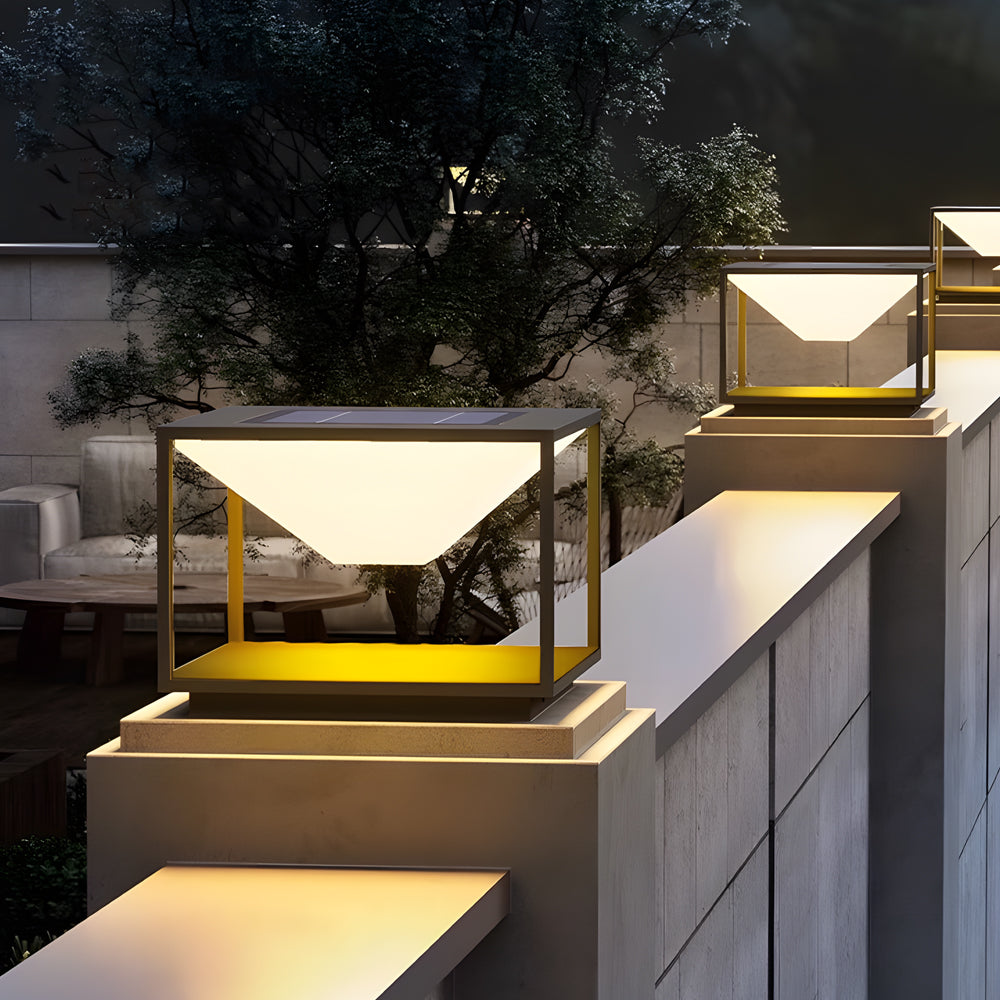 Sleek outdoor lighting cubes arranged on contemporary patio steps creating ambient evening atmosphere