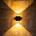 Modern black curved outdoor wall light with integrated LED and sleek geometric design