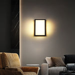 Stylish wall light providing ambient lighting in modern living room interior design