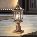 Traditional post light positioned on concrete surface providing elegant pathway illumination with classic styling