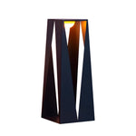 Tall triangular outdoor light fixture with modern angular silhouette and illuminated panels