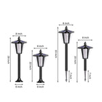 Vintage-inspired black outdoor light fixture with hexagonal glass panels and finial top