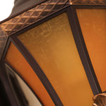 Vintage-style outdoor lighting installation on white colonial home creating charming curb appeal with classic lantern design